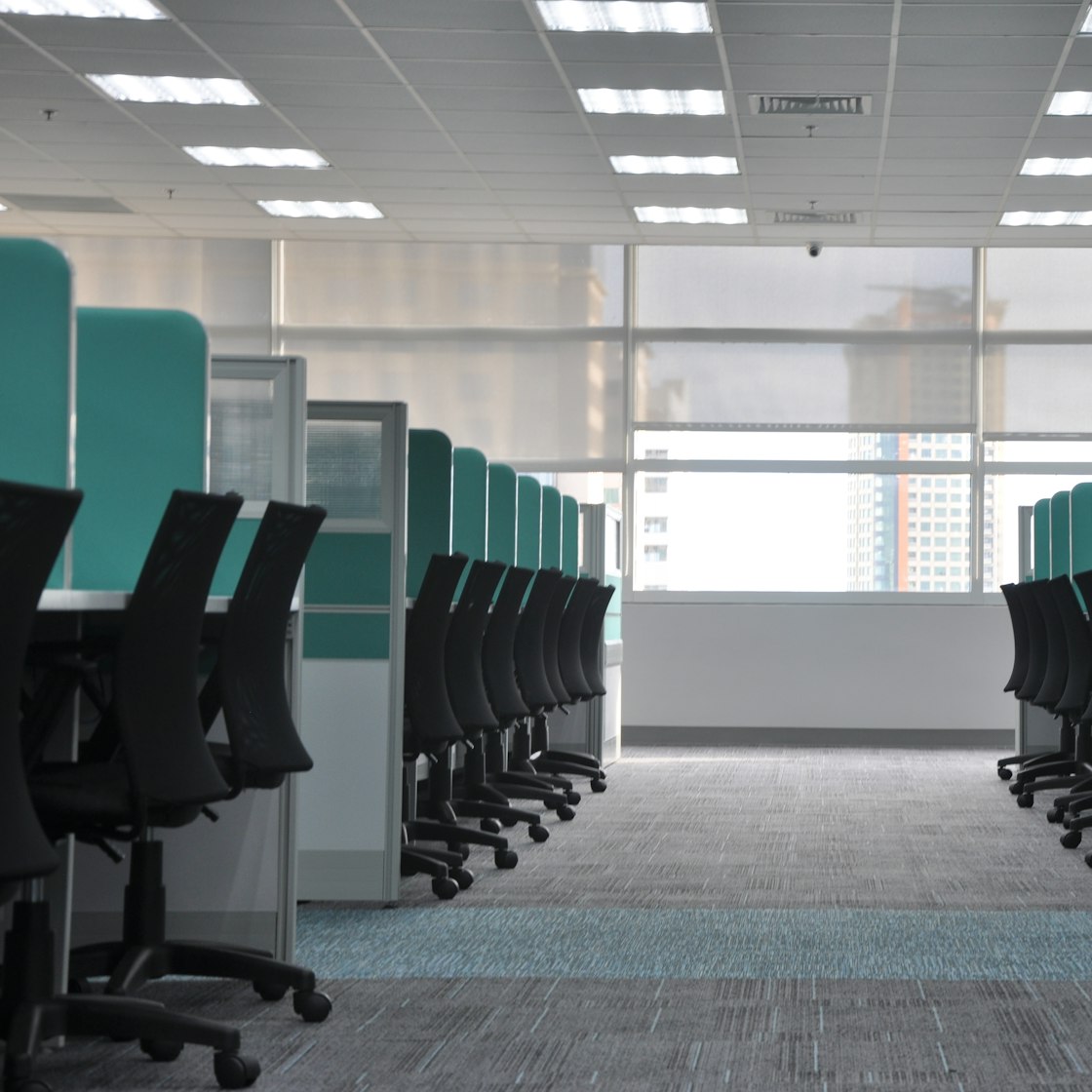 Emptied office workstations cleared for a commercial move
